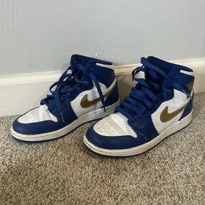 Nike Kids White and Blue Sneakers with Gold Accents